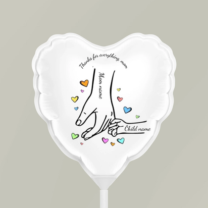 Mamá con globo de helio