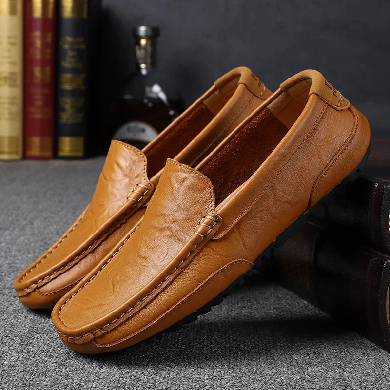 Mocasines informales transpirables de piel auténtica para hombre, zapatos de cuero sin cordones, formales, italianos, planos, para conducir